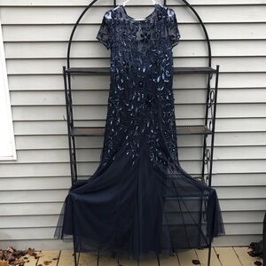 Adraianna Pappel Navy Blue Sequin gown, trumpet sheer bottom. Short sleeves. 14